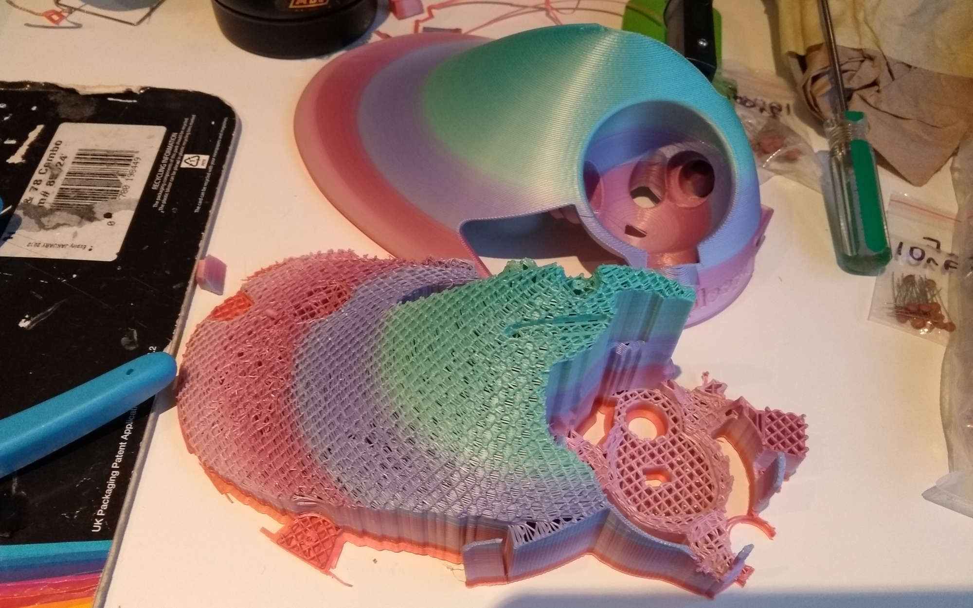 Too much support! 3D printed top next to the mass of supports that were underneath it