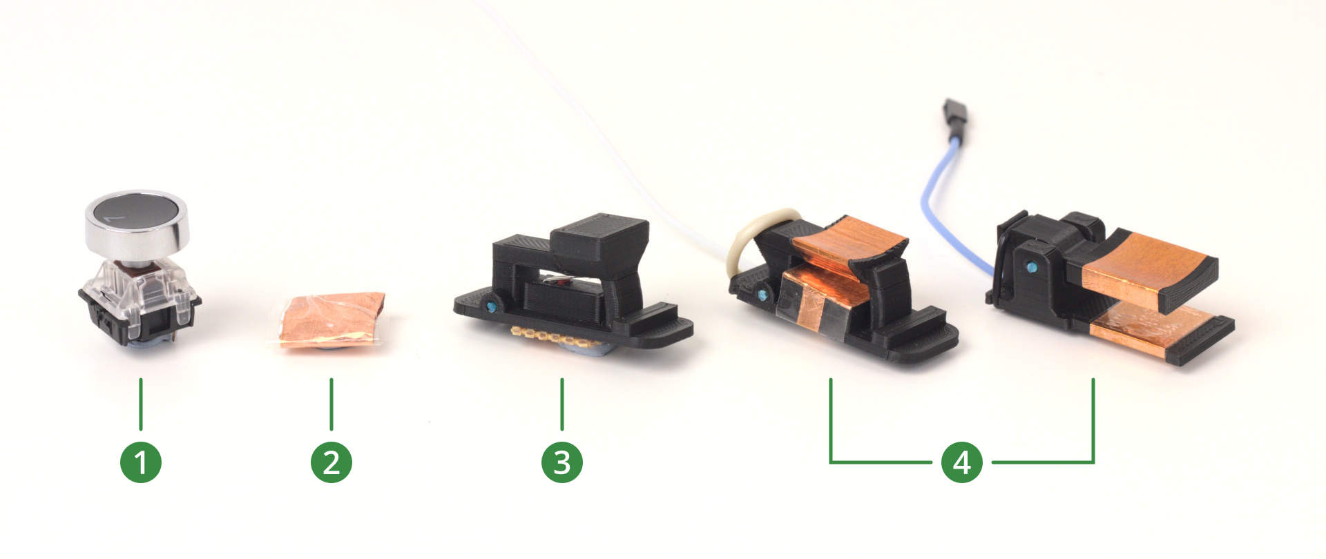 A line of 5 prototype switches. Number 1 is a keyboard switch with a keycap on top, 2 is a square centimetre of cardboard wrapped in copper foil and then clear tape. 3 is a 3D printed switch with a button on the top which presses on a microswitch. The remaining two are both numbered 4 and are similar, with a 3D printed lever shape over a base, both wrapped in copper foil.